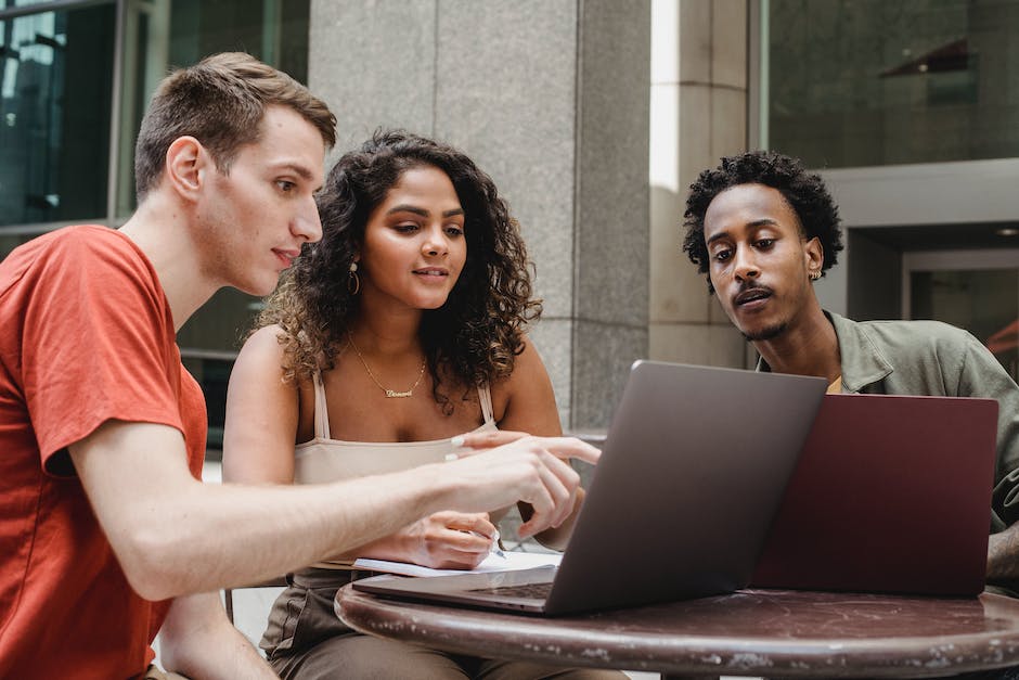 Image depicting a diverse group of people collaborating and working together.