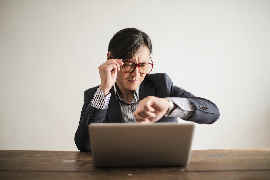 Image depicting a person managing their time and tasks efficiently, practicing self-care, and using productivity tools for effective self-management